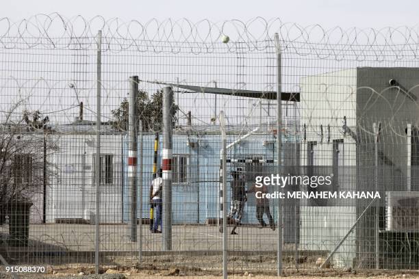 Picture taken on February 4, 2018 shows detained African migrants inside the Holot detention centre, located in Israel's southern Negev desert near...