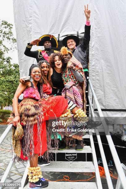 Win Butler and Regine Chassagne of Arcade Fire pose for a photo with Haitian musicians during the Inaugural Krewe du Kanaval ion February 6, 2018 in...