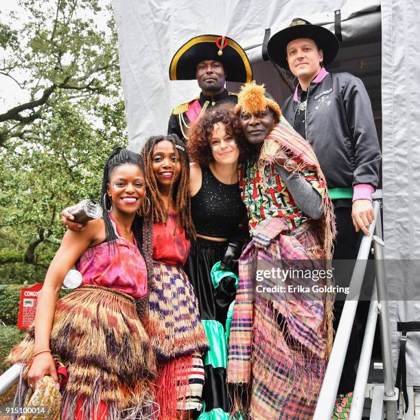 Win Butler and Regine Chassagne of Arcade Fire pose for a photo with Haitian musicians during the Inaugural Krewe du Kanaval ion February 6, 2018 in...