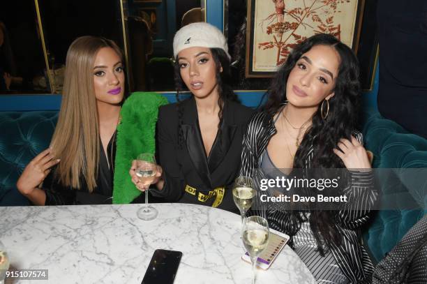 Annie Ashcroft, Chanal Benjilali and Nadine Samuels of M.O attend the InStyle EE Rising Star Party at Granary Square on February 6, 2018 in London,...