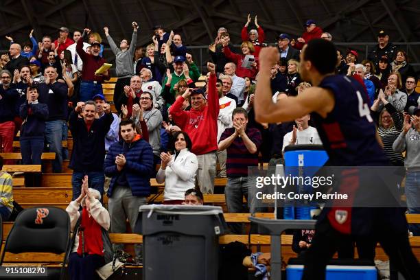 Darnell Foreman of the Pennsylvania Quakers acknowledges the crowd as he and other starters finish for the earning with the team up 21 points with...