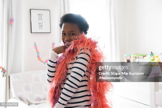 portrait of girl with boas dancing at home - boa stock pictures, royalty-free photos & images