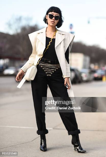 Michelle Song is seen wearing a Drome jacket, Y/Project pants, Saint Laurent shoes and Pinko sunglasses outside the Death to Tennis show during New...