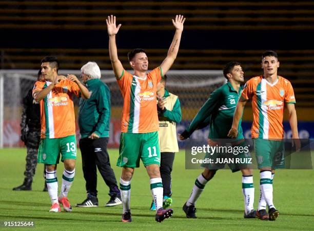 Argentina's Banfield players celebrate at the end of their Copa Libertadores football match against Ecuador's Independiente del Valle, at Olympic...