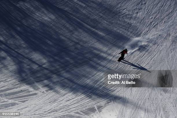 An athlete trains during the Snowboard practice session during previews ahead of the PyeongChang 2018 Winter Olympic Games at Phoenix Snow Park on...