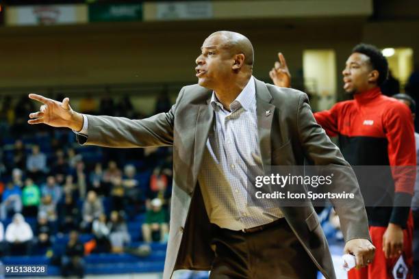 Northern Illinois Huskies head coach Mark Montgomery reacts to his team's performance on the court during the second half of a regular season...