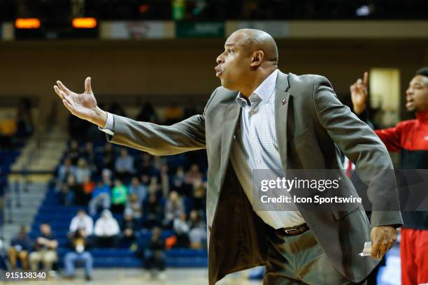 Northern Illinois Huskies head coach Mark Montgomery reacts to his team's performance on the court during the second half of a regular season...