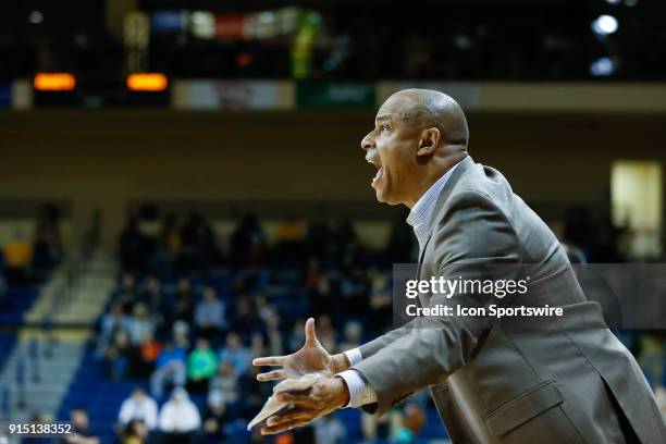 Northern Illinois Huskies head coach Mark Montgomery reacts to his team's performance on the court during the second half of a regular season...