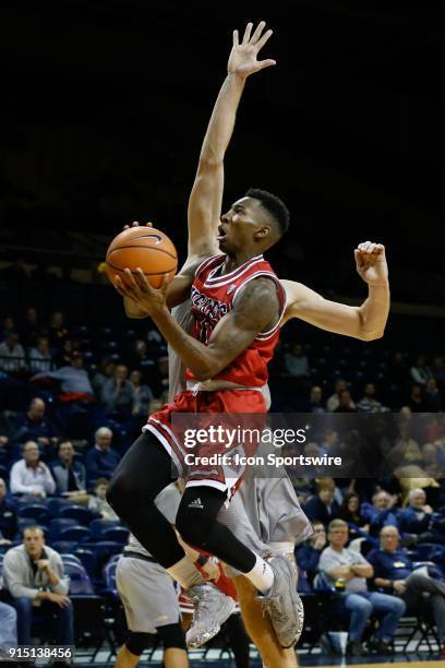 Northern Illinois Huskies guard Eugene German goes in for a layup during the second half of a regular season Mid-American Conference game between the...