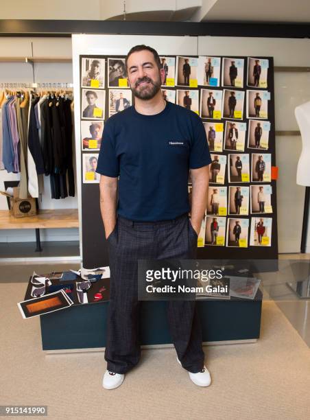 Designer Michael Maccari poses backstage at the Perry Ellis fashion show during New York Fashion Week Mens' at The Hippodrome Building on February 6,...