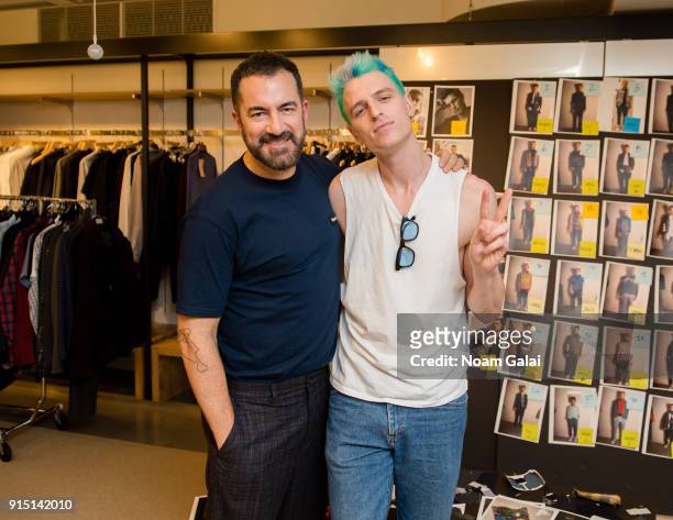 Designer Michael Maccari and MILK pose backstage at the Perry Ellis fashion show during New York Fashion Week Mens' at The Hippodrome Building on...