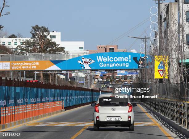 Cars move past the Gangneung Olympic Village ahead of the PyeongChang 2018 Winter Olympic Games on February 7, 2018 in Pyeongchang-gun, South Korea.