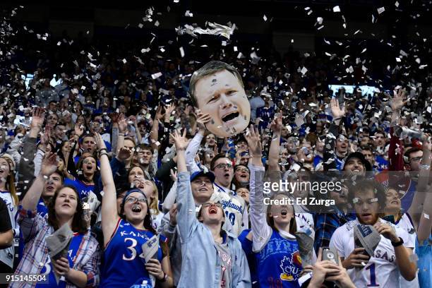 Kansas Jayhawks fans cheer on their team as they are introduced prior to a game against the TCU Horned Frogs at Allen Fieldhouse on February 6, 2018...
