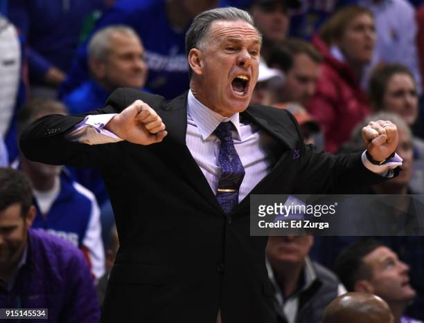 Jamie Dixon head coach of the TCU Horned Frogs directs his team against the Kansas Jayhawks at Allen Fieldhouse on February 6, 2018 in Lawrence,...
