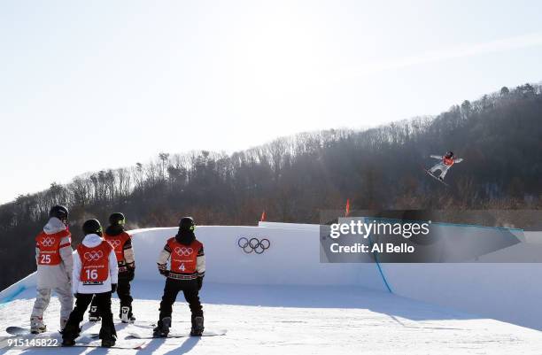 Athletes watch the Snowboard practice session during previews ahead of the PyeongChang 2018 Winter Olympic Games at Phoenix Snow Park on February 7,...