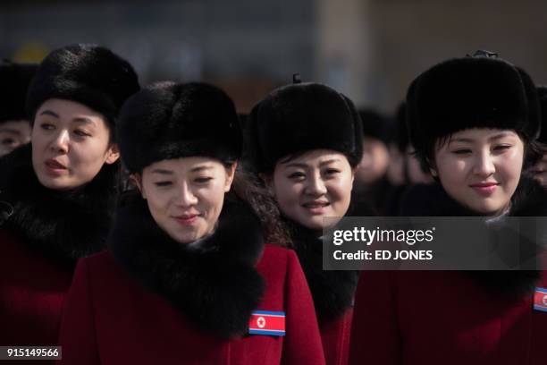 North Korean cheerleaders arrive at a rest stop as their bus convoy carrying a 280-member delegation on its way to the 2018 Pyeongchang winter...