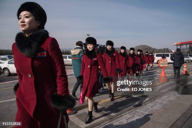 North Korean cheerleaders arrive at a rest stop as their bus convoy carrying a 280-member delegation on its way to the 2018 Pyeongchang winter...