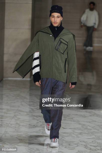 Model walks the runway wearing Perry Ellis Fall 2018 at The Hippodrome Building on February 6, 2018 in New York City.