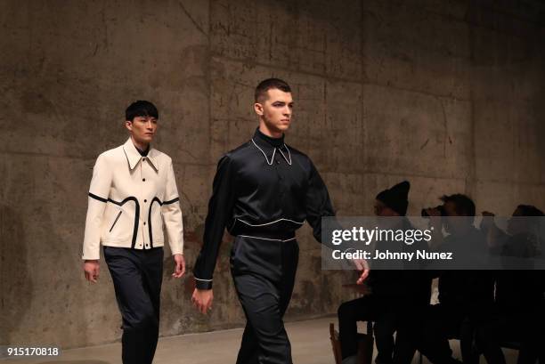 Models walk the runway during the Carlos Campos - February 2018 - New York Fashion Week Mens' presentation at Skylight Modern on February 6, 2018 in...