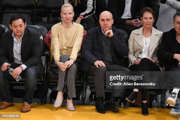 Russian Entrepreneur Yuri Milner and wife Julia Milner attend a basketball game between the Los Angeles Lakers and the Phoenix Suns at Staples Center...