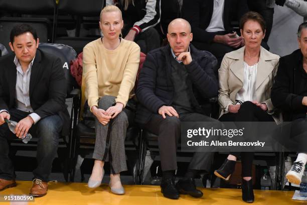 Russian Entrepreneur Yuri Milner and wife Julia Milner attend a basketball game between the Los Angeles Lakers and the Phoenix Suns at Staples Center...