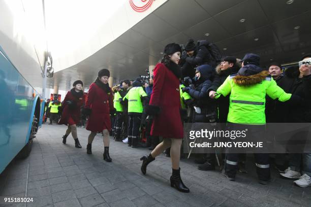 North Korean cheerleaders arrive at the Inje Speedium, a racetrack and hotel complex, in Inje, north of Pyeongchang on February 7, 2018 ahead of the...