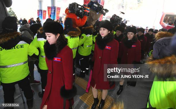 North Korean cheerleaders arrive at the Inje Speedium, a racetrack and hotel complex, in Inje, north of Pyeongchang on February 7, 2018 ahead of the...