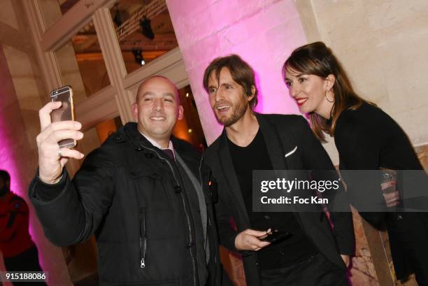 Philippe Lacheau poses for a selfie during the Trophees du Film Francais 2018 at Palais Brogniart on February 6, 2018 in Paris, France.