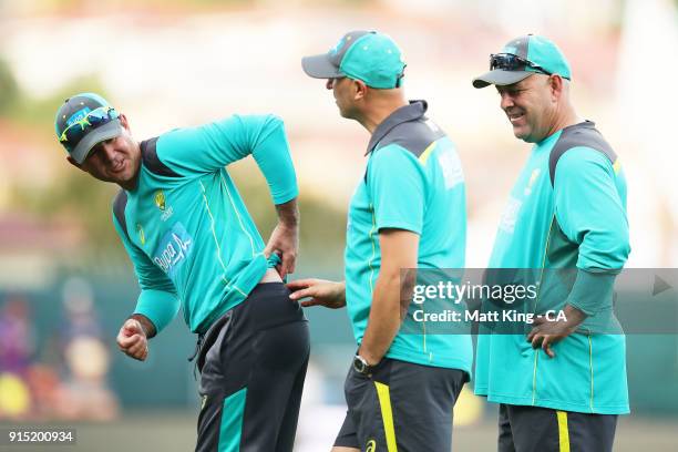 Australian assistant coach Ricky Ponting talks to Australian head coach Darren Lehmann during the Twenty20 International match between Australia and...