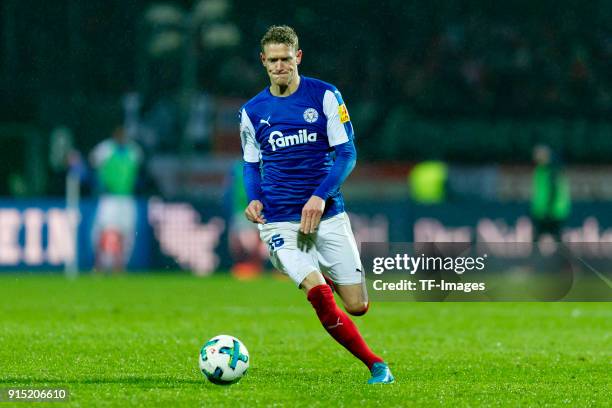 Johannes van den Bergh of Kiel controls the ball during the Second Bundesliga match between Holstein Kiel and 1. FC Union Berlin at Holstein-Stadion...