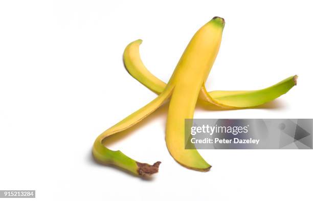 peeled banana with copy space - banana peel stock pictures, royalty-free photos & images