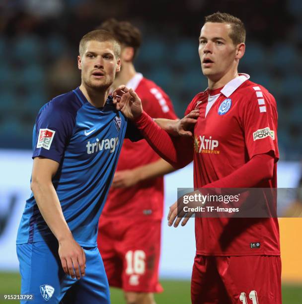 Stanislav Iljutcenko of Duisburg and Johannes Wurtz of Bochum look on during the second Bundesliga match between VfL Bochum 1848 and MSV Duisburg at...