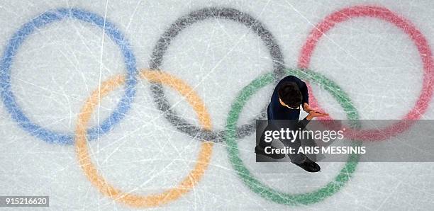An athlete practices during a figure skating training session at Gangneung Ice Arena, ahead of the Pyeongchang 2018 Winter Olympic Games on February...
