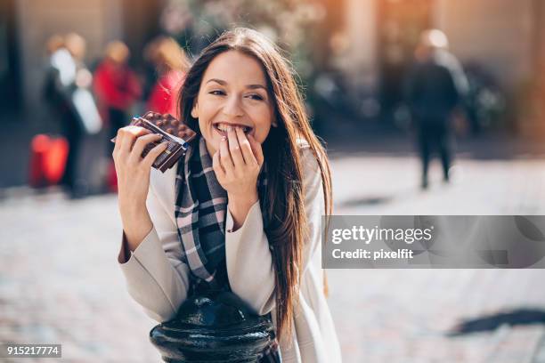 guilty pleasures - chocolate eating stock-fotos und bilder