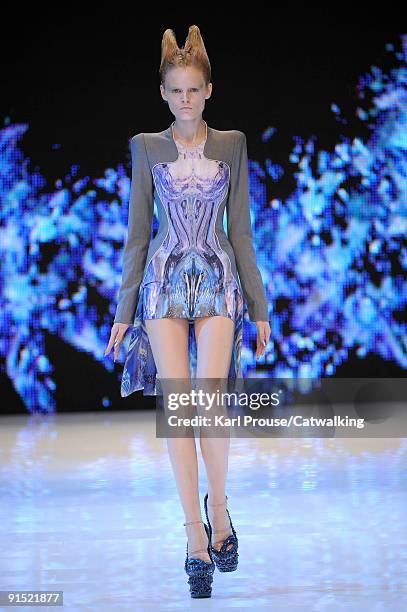 Model walks the runway during the Alexander McQueen Ready To Wear show as part of the Paris Womenswear Fashion Week Spring/Summer 2010 at Salle...