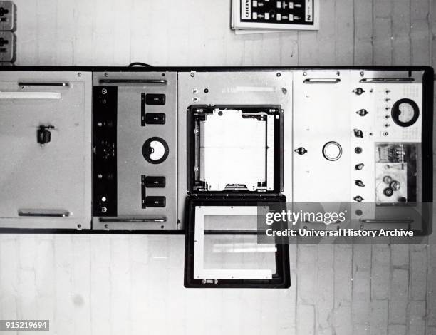 Photograph of an aperture synthesis recorder, a type of interferometry that mixes signals from a collection of telescopes to produce images having...