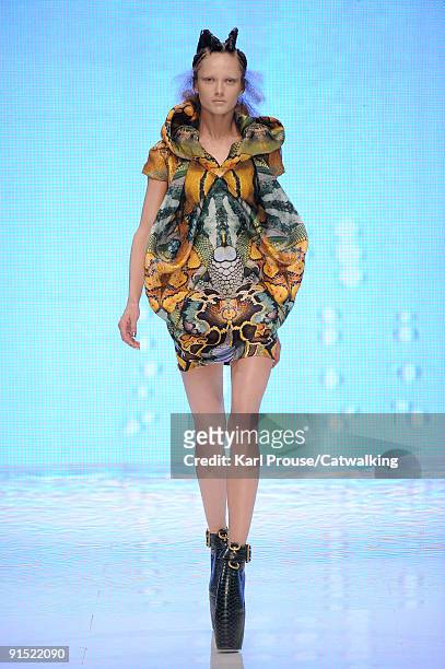 Model walks the runway during the Alexander McQueen Ready To Wear show as part of the Paris Womenswear Fashion Week Spring/Summer 2010 at Salle...