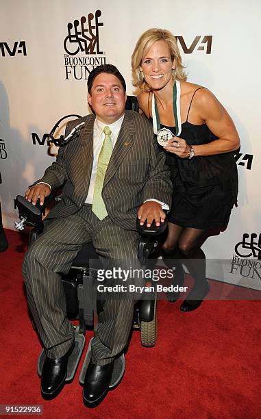 Marc Buoniconti and honoree Dara Torres arrive at The 24th Annual Great Sports Legends Dinner benefiting The Buoniconti Fund to Cure Paralysis at The...