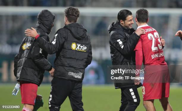 Head coach Ilia Gruev of Duisburg hugs Fabian Schnellhardt of Duisburg after the second Bundesliga match between VfL Bochum 1848 and MSV Duisburg at...