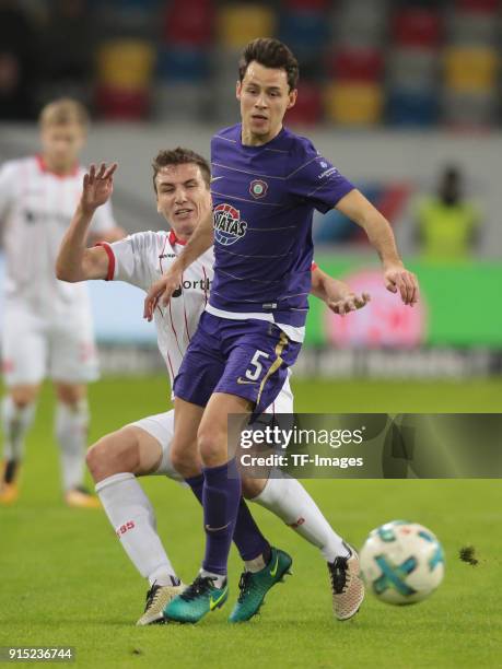 Clemens Fandrich of Aue and Marcel Sobottka of Duesseldorf battle for the ball during the Second Bundesliga match between Fortuna Duesseldorf and FC...