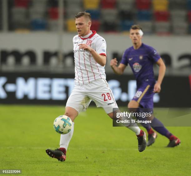 Rouven Hennings of Duesseldorf controls the ball during the Second Bundesliga match between Fortuna Duesseldorf and FC Erzgebirge Aue at ESPRIT arena...