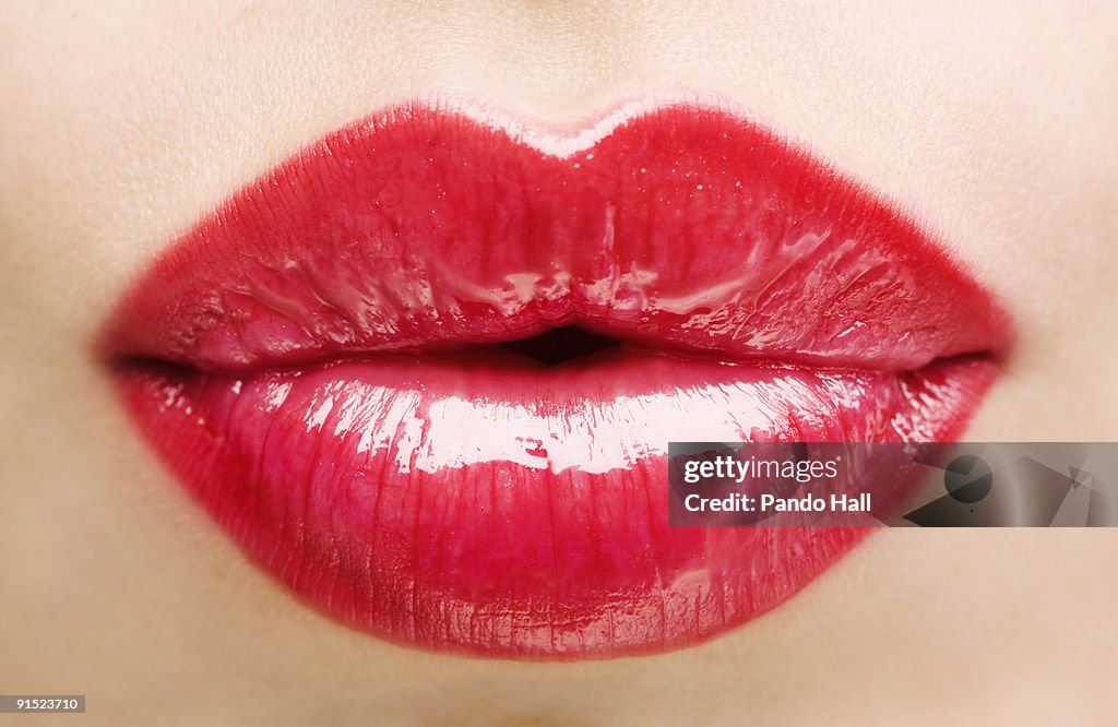 Woman puckering lips, close-up