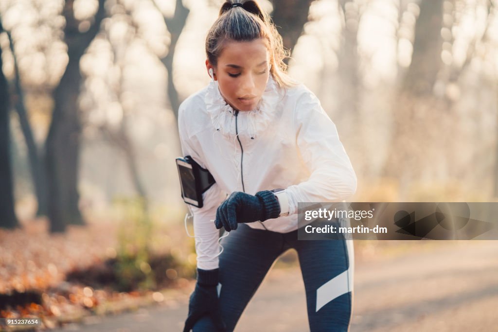 Sportswoman checking pulse