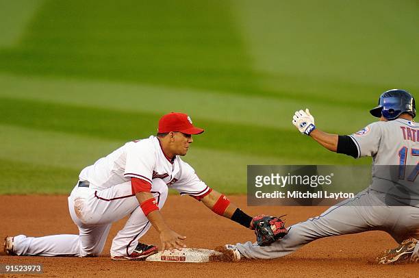 Alberto Gonzalez of the Washington Nationals makes the tag at second base against Fernando Tatis of the New York Mets on September 30, 2009 at...