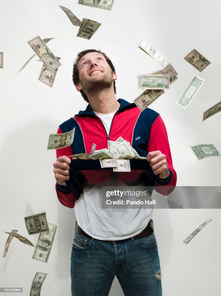 Catching Money Raining Young Man Catching Money Raining Down High-Res Stock Photo - Getty Images