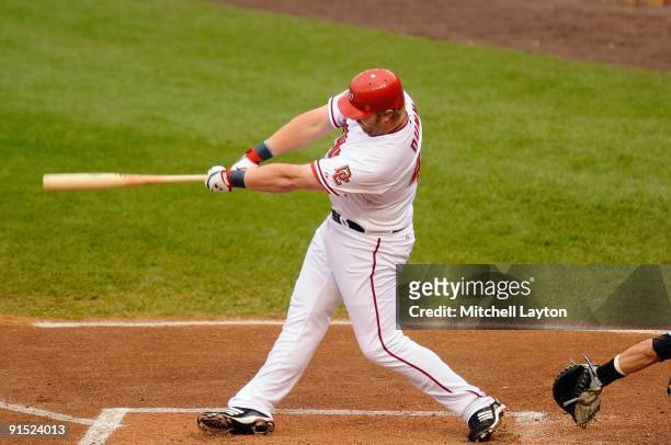 Adam Dunn of the Washington Nationals takes a swing during a baseball game against the New York Mets on September 30, 2009 at Nationals Park in...