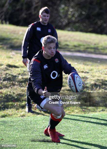 Harry Mallinder passes the ball during the England training session held at Pennyhill Park on February 7, 2018 in Bagshot, England.
