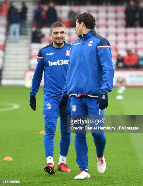 Stoke City's Kostas Stafylidis and Ramadan Sobhi warming up before the game