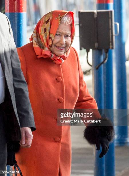 Queen Elizabeth II boards her train back to London after the Christmas break at Sandringham on February 7, 2018 in King's Lynn, England.