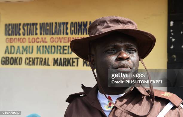 This photograph taken on February 3 shows the Head of The Vigilante Liaison Office Comrade Tosin Ibitoye as he speaks about violence that led to...